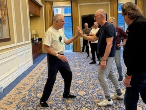 Testing a hand-to-hand push in a Tai Chi Chuan stance